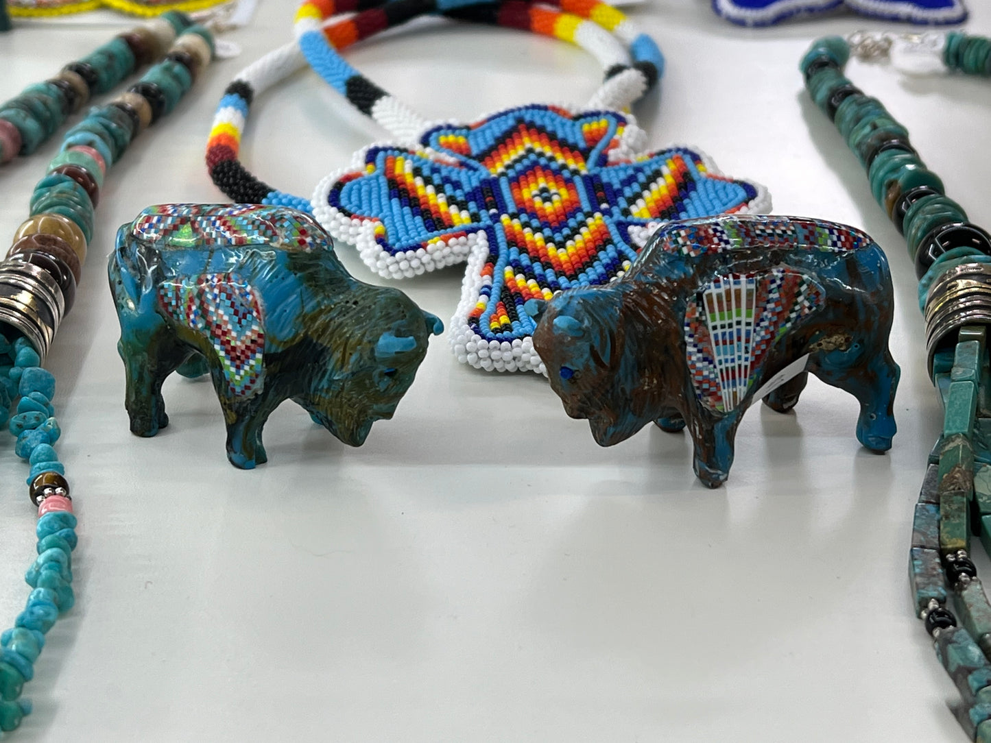 Small Buffalo Carvings with Turquoise Inlay